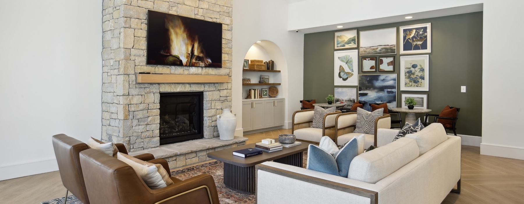 lounge with seating tv and fireplace