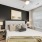 Modern furnishings in primary bedroom  in the model unit at The Finch