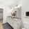 Primary bathroom with walk-in closet attached in apartment homes at The Finch
