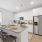 Natural granite countertops and kitchen islands in apartment homes at The Finch