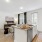 Apartment kitchen opens up to living room in units at The Finch